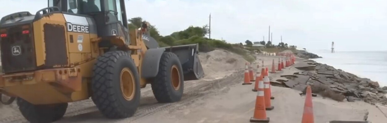 Workers rebuild the road at Huguenot Park. | News4Jax