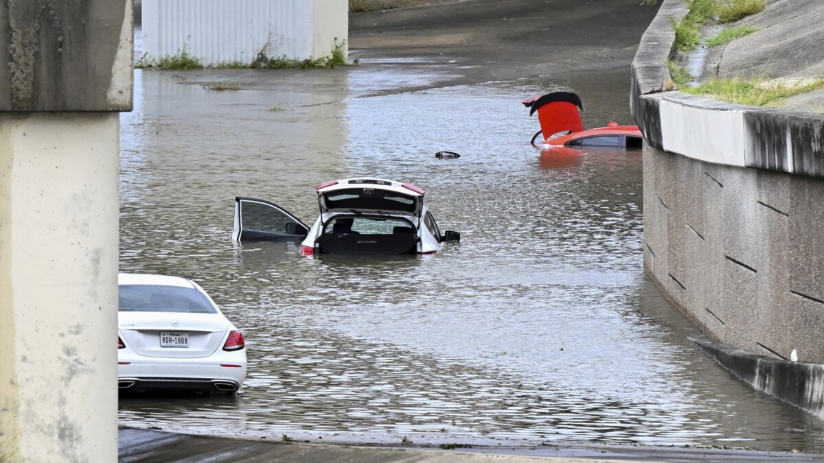 Flooding strands vehicles near downtown Houston on Monday, July 8, 2024, after Hurricane Beryl came ashore in Texas. | Maria Lysaker, AP