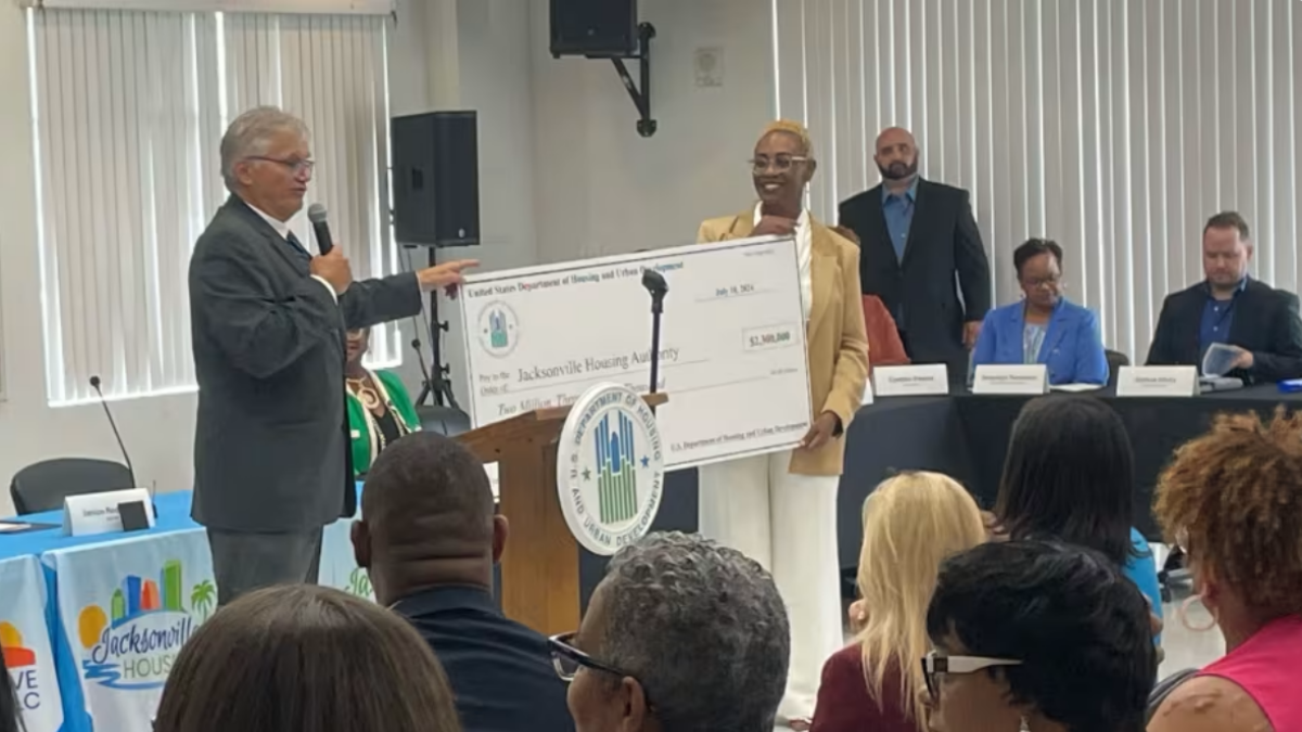 The U.S. Department of Housing and Urban Development presents a check to the Jacksonville Housing Authority. | News4Jax