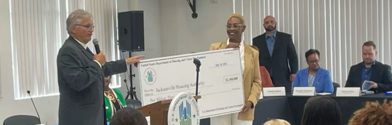 The U.S. Department of Housing and Urban Development presents a check to the Jacksonville Housing Authority. | News4Jax