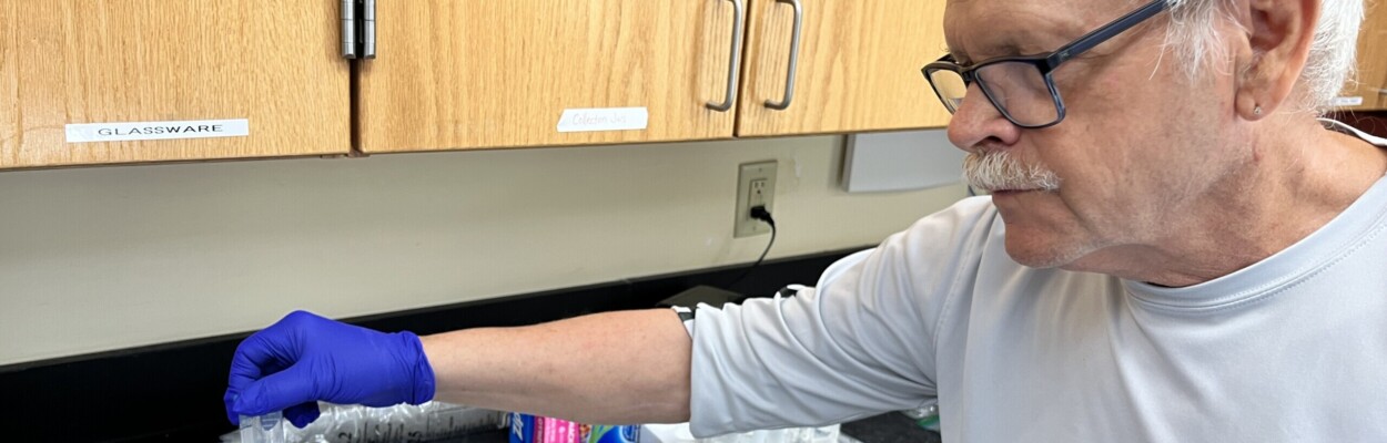 Volunteer researcher Jeff Finnan prepares a sea turtle egg for genetic testing at the Guana Tolomato Matanzas Research Reserve. | Noah Hertz, Jacksonville Today