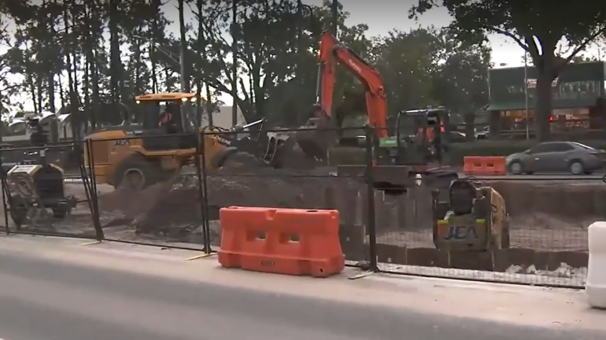 Crews work on a broken water main on San Jose Boulevard. | News4Jax