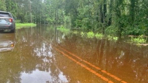 The Black Creek floods Lazy Acres Road in Clay County on Tuesday, Aug. 6, 2024. | Clay County