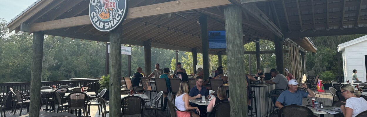 Diners sit out back of the Crabshack during its soft reopening. | Megan Mallicoat, Jacksonville Today