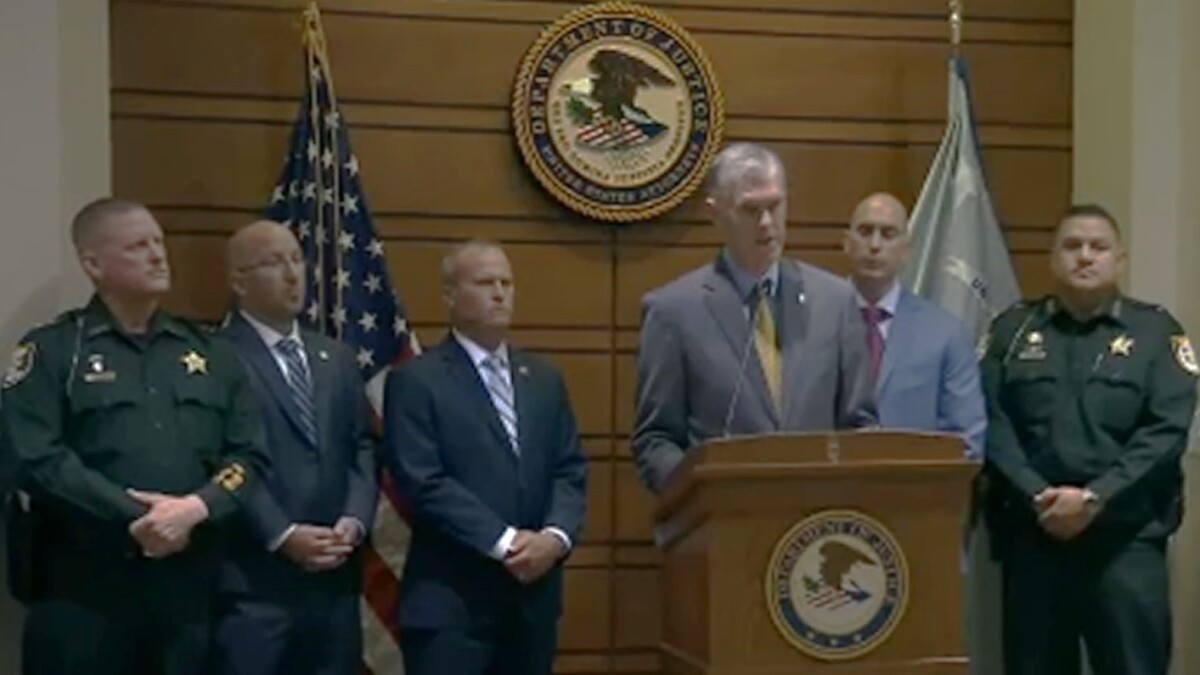 Roger Handberg, U.S. attorney for the Middle District of Florida, joins local and federal law enforcement officials to announce the indictment of two Jacksonville men. | News4Jax