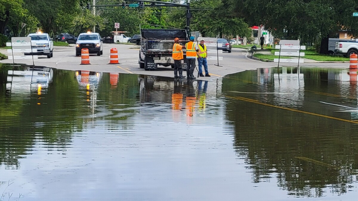 City crews work to clear storm drains after flooding on Old St. Augustine Road at San Jose Boulevard on Friday morning, Sept. 6, 2024. | Dan Scanlan, Jacksonville Today