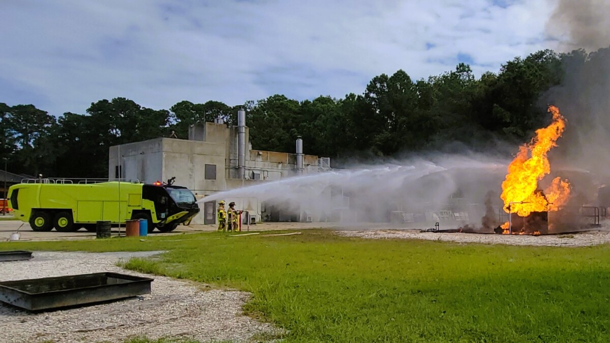 Fire truck extinguishes blaze.