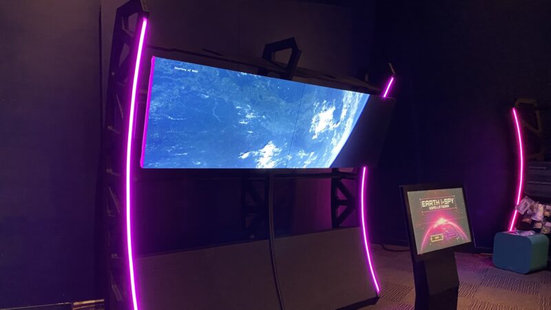 The Earth I-Spy area at the new Mission: Astronaut exhibit asks visitors if they can guess the correct satellite image of earth. l Steven Ponson, Jacksonville Today.