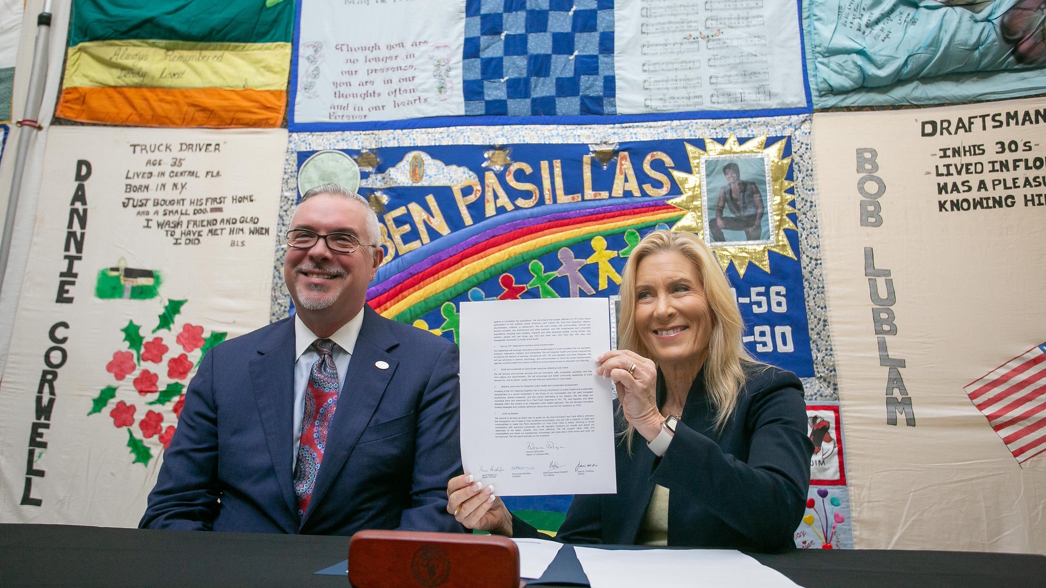 Wednesday, Jacksonville Mayor Donna Deegan and President of the Fast Track Cities Institute José M. Zuniga sign a document allowing the city to join a partnership to help stop the spread of HIV by 2023.