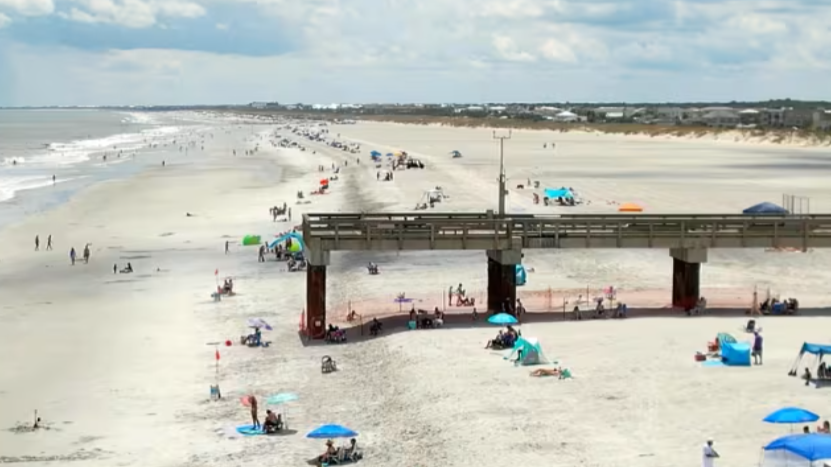 The pillars of the pier are fully exposed after the beach renourishment by the U.S. Army Corps of Engineers. | News4Jax