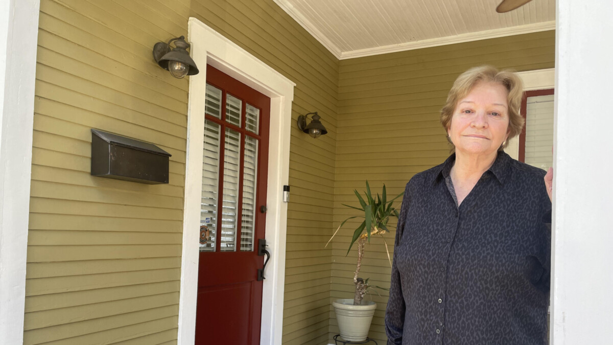 Maria Lopez, 75, is a homeowner in Tampa who was bounced around from home insurer to home insurer and is considering the possibility of one day going without coverage. | Jessica Meszaros, WUSF