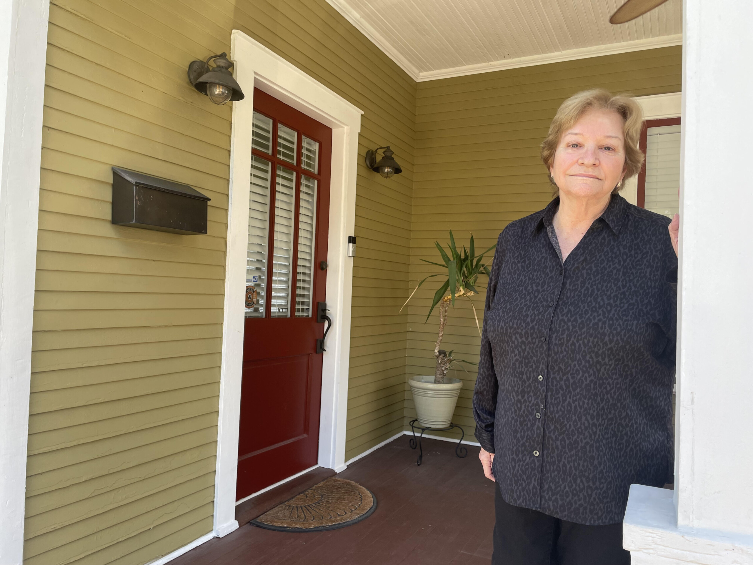 Maria Lopez, 75, is a homeowner in Tampa who was bounced around from home insurer to home insurer and is considering the possibility of one day going without coverage. | Jessica Meszaros, WUSF