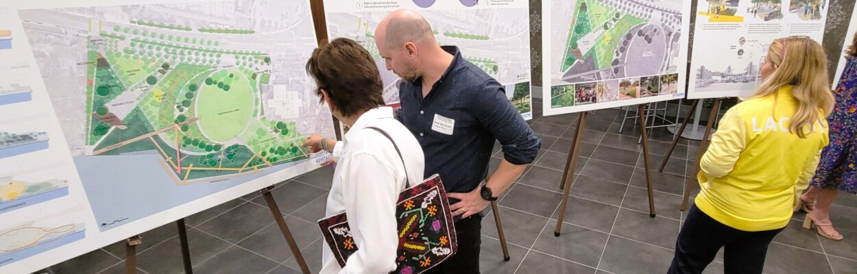 People look at the final design proposal for Metropolitan Park.