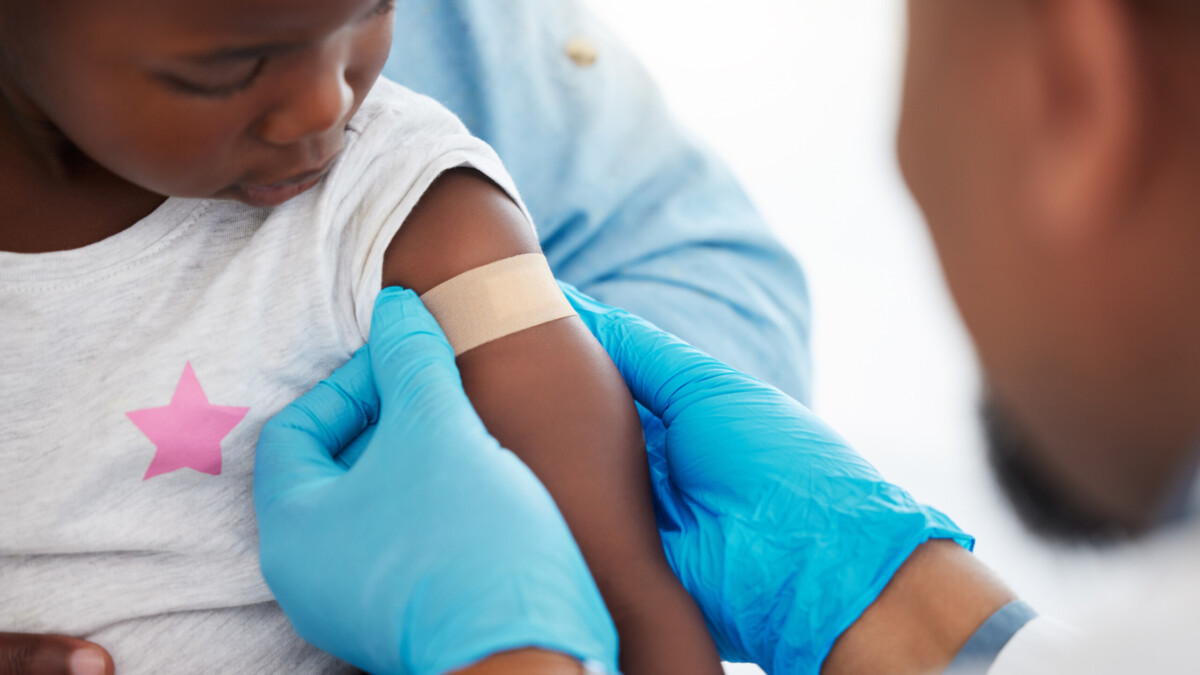 A child gets a vaccination.