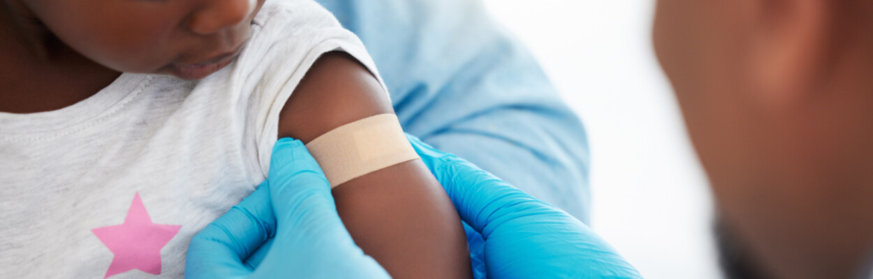 A child gets a vaccination.