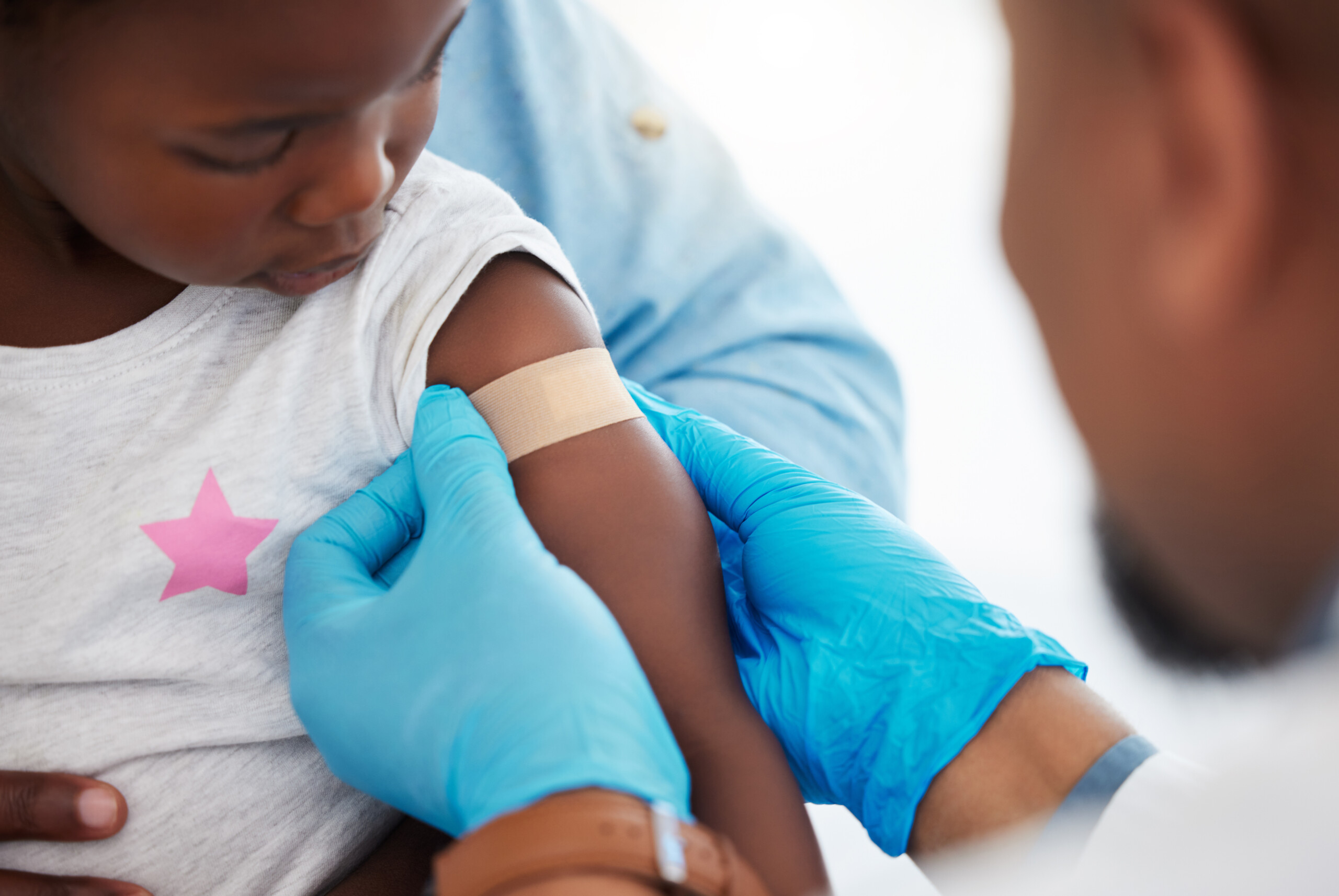 A child gets a vaccination.