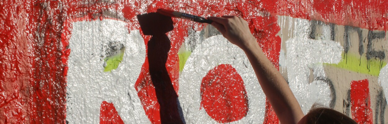 Abortion rights supporters paint a wall