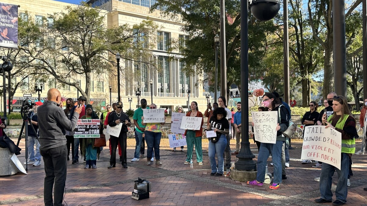 Community members protest a new jail.