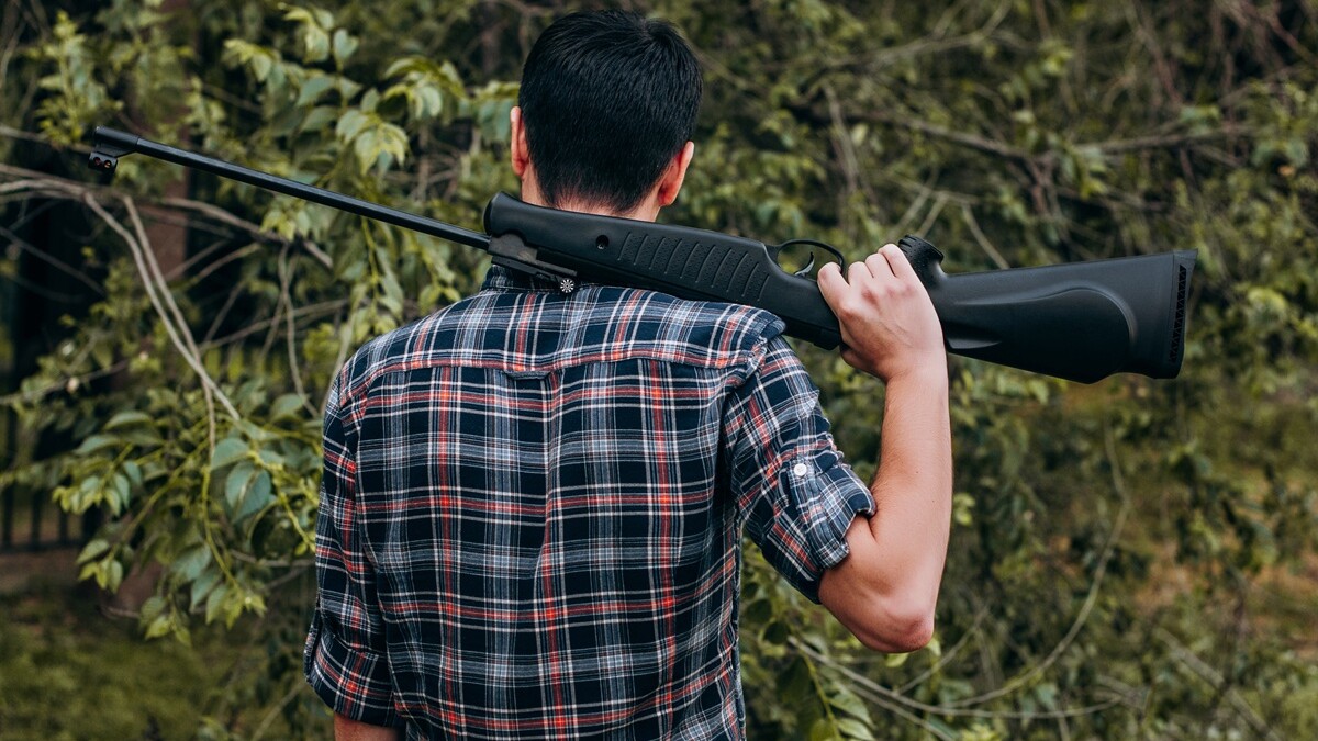 Young person with gun