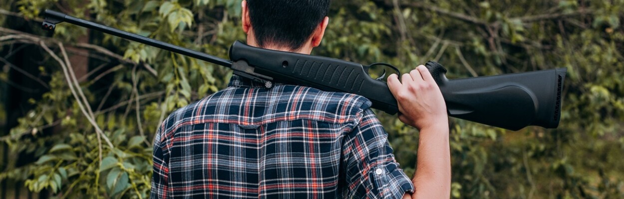 Young person with gun