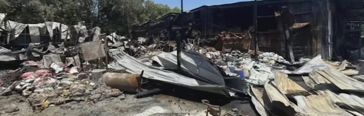 Rubble from the fire at Ace Hardware in Orange Park