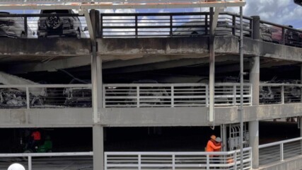 Featured image for “60 vehicles still trapped in burned airport parking garage”