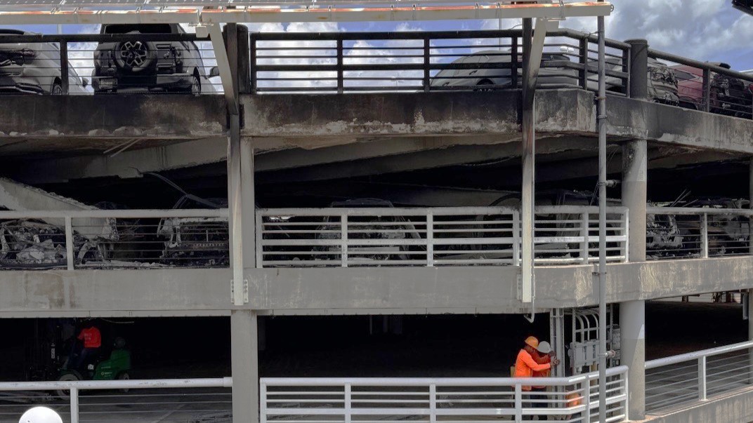 Featured image for “60 vehicles still trapped in burned airport parking garage”