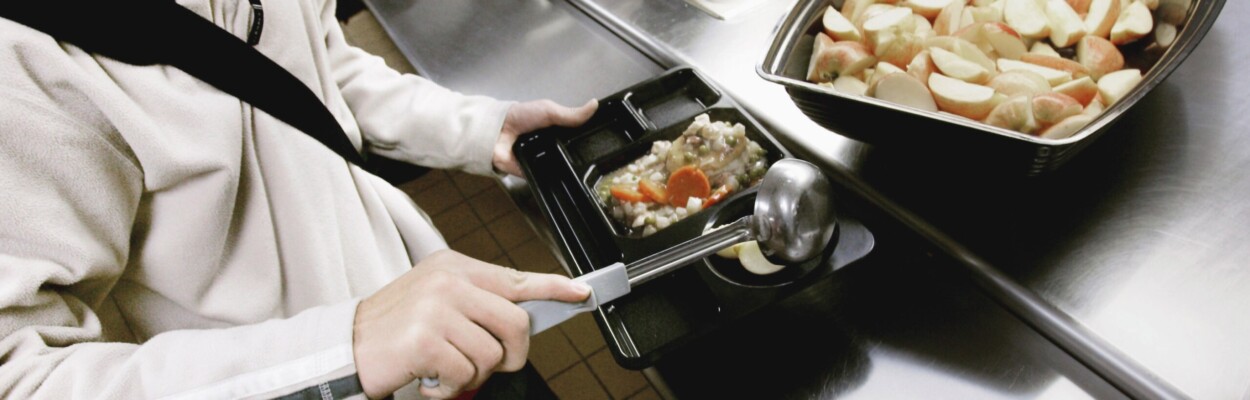 Student with school lunch