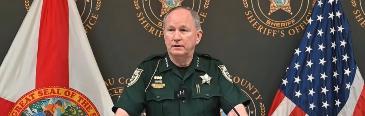 Nassau County Sheriff Bill Leeper speaking at a podium.