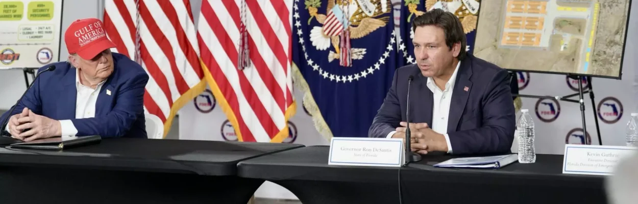 President Donald Trump and Gov. Ron DeSantis speak during Trump's visit to Alligator Alcatraz. | DeSantis on X