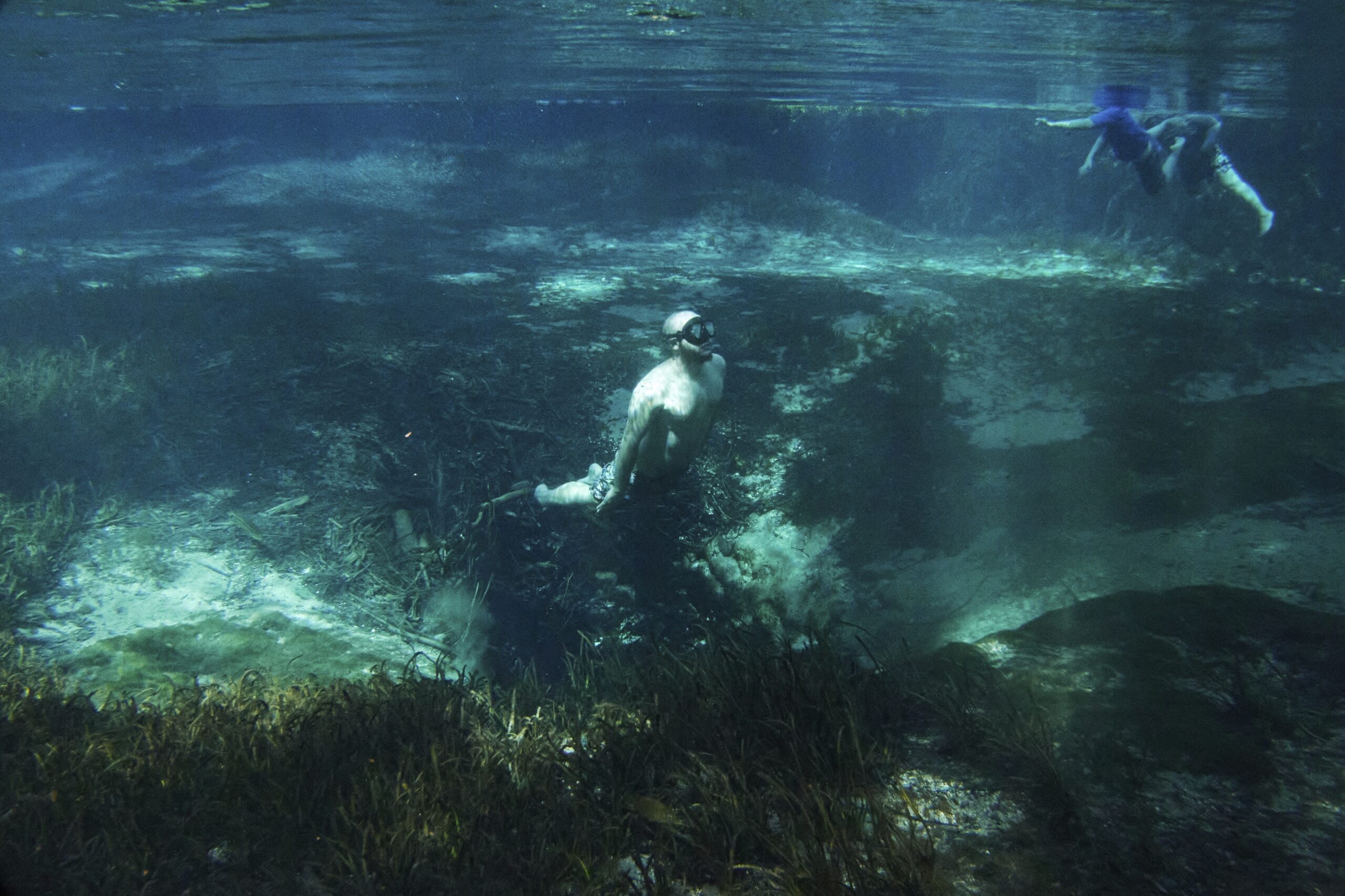 A diver in the Blue Hole vent