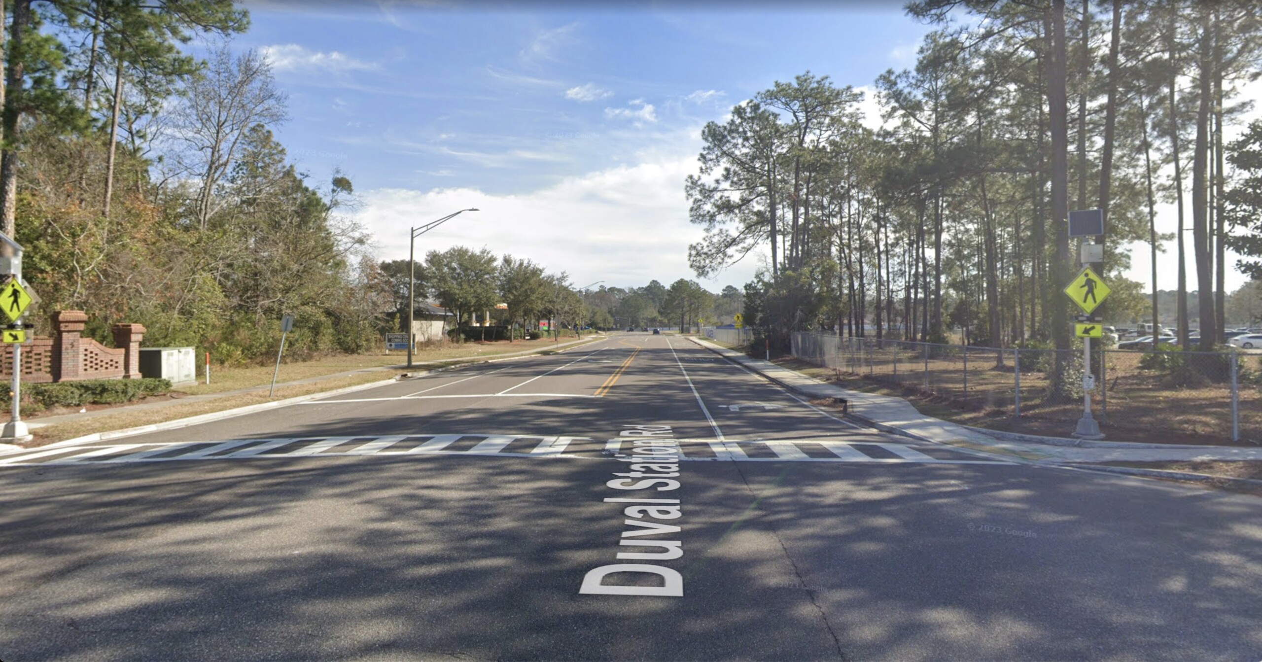 A crosswalk in front of First Coast High School | Google Maps