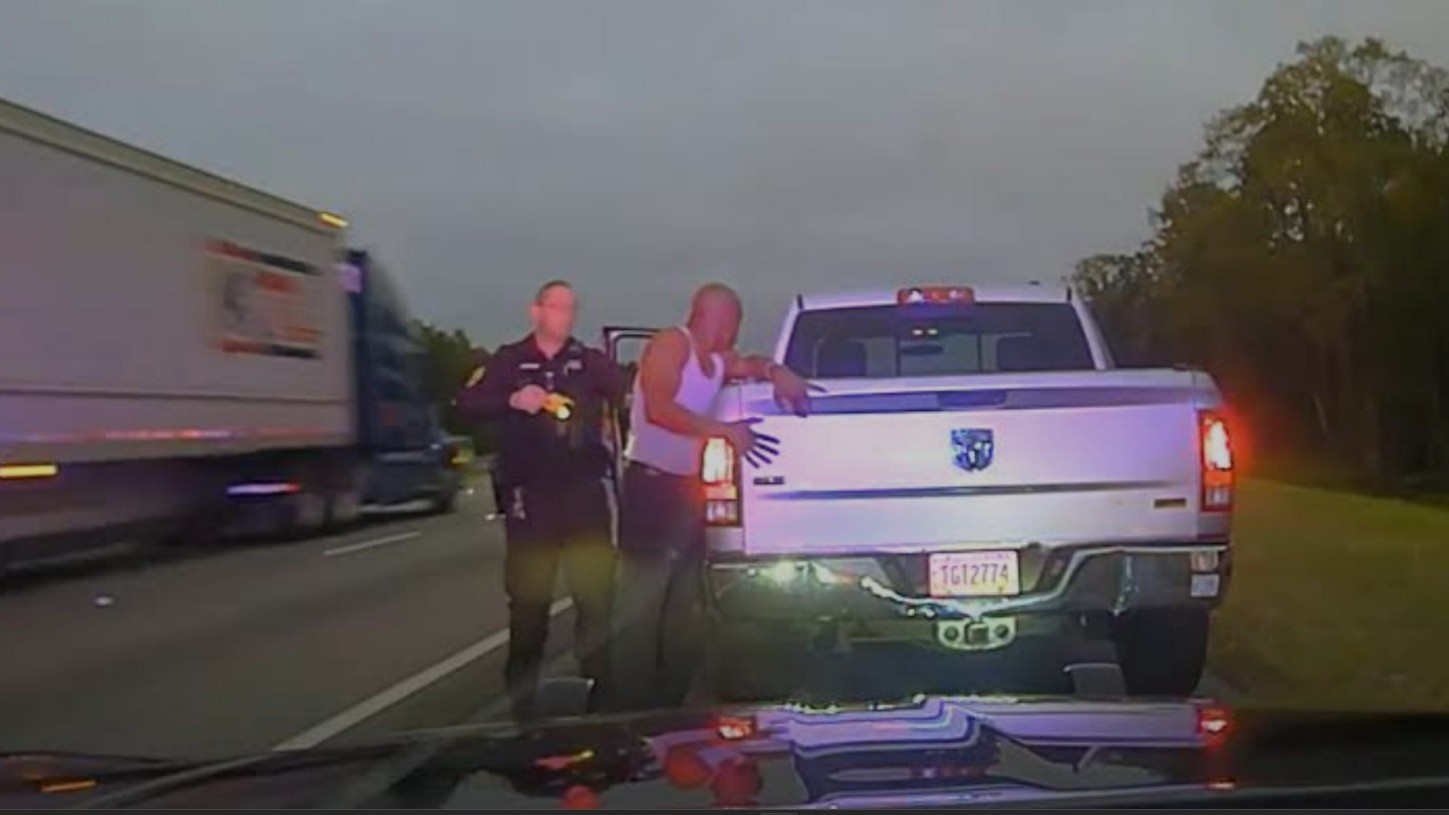 A clip from a video shows Camden County sheriff's Sgt. Buck Aldridge arresting a man.
