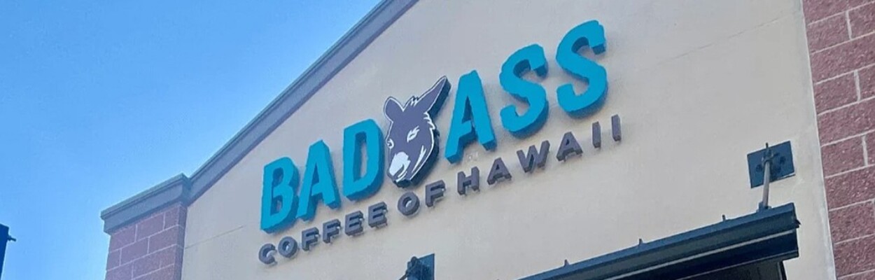 Sign on storefront of Bad Ass Coffee.