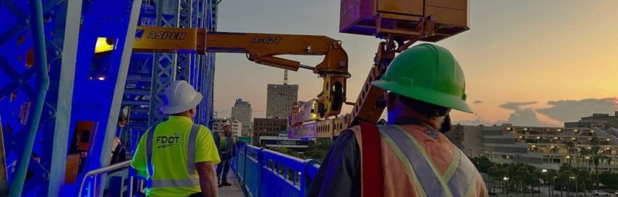 State transportation crews inspect the Main Street Bridge.