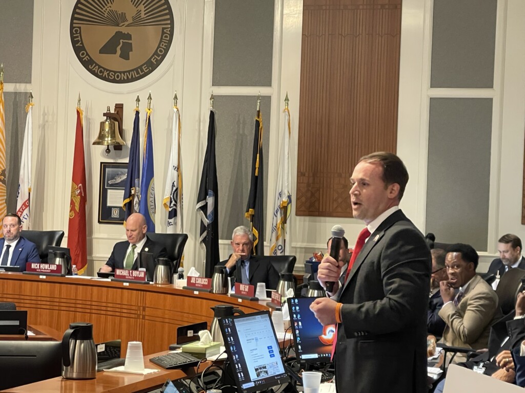 Rory Diamond stands to speak