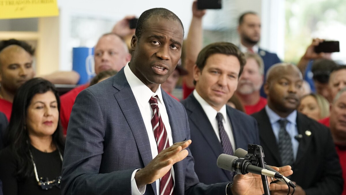 Florida Surgeon General Dr. Joseph Ladapo speaks before a bill signing by Gov. Ron DeSantis