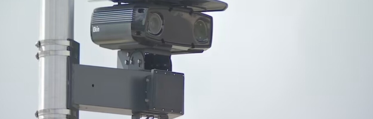 A red-light camera on a pole in Orange Park