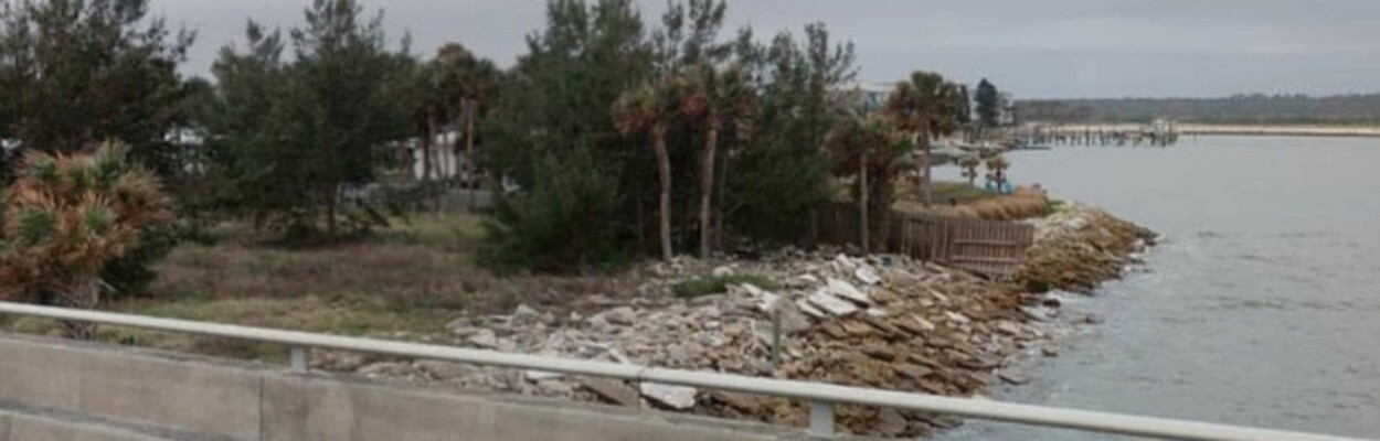 Trees and rocks on the site of the former Matanzas Innlet Restaurant.