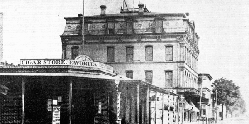 Black and white historic photo of a cigar store