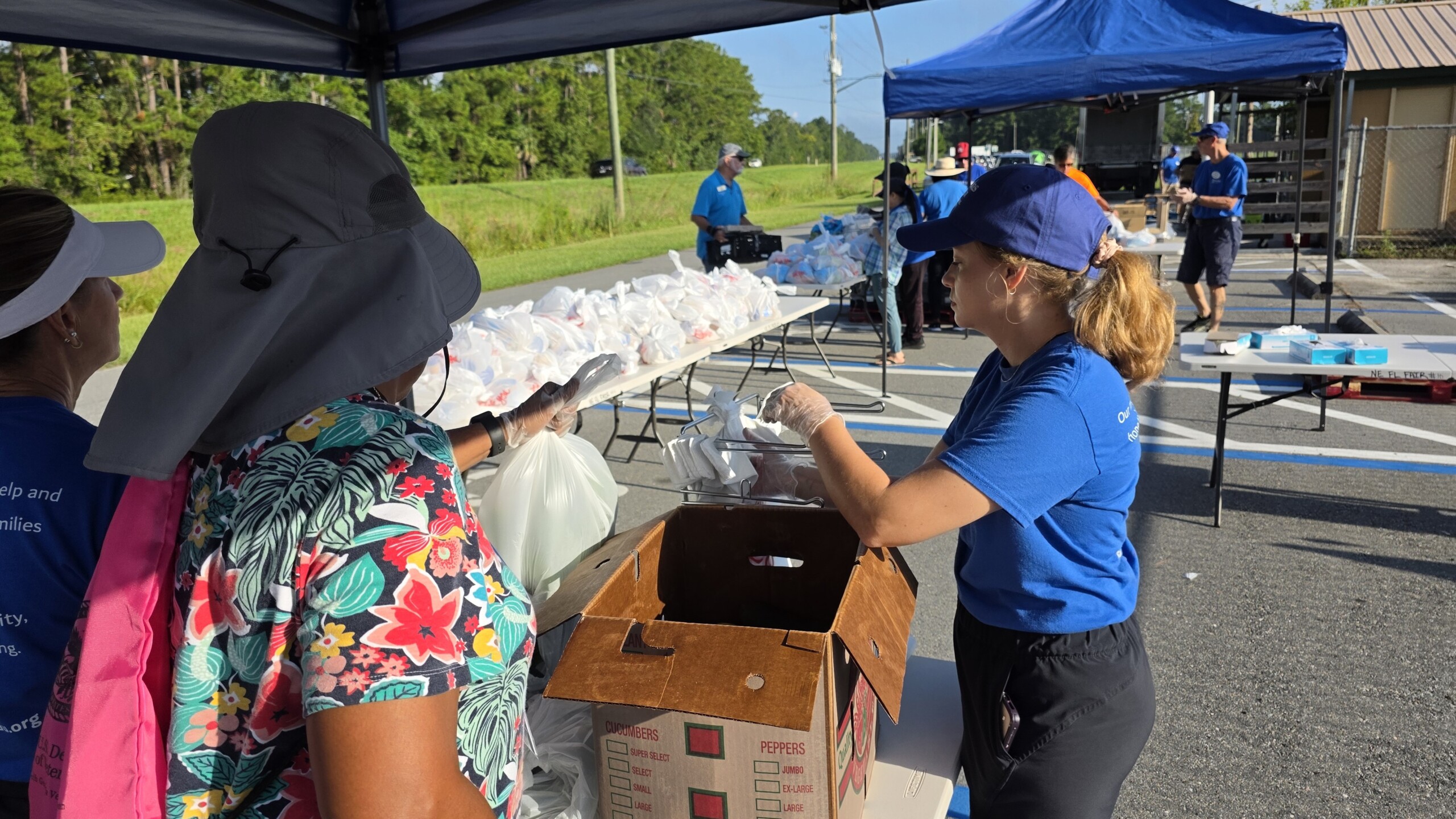 Barnabus Center workers distributing food in Callahan.