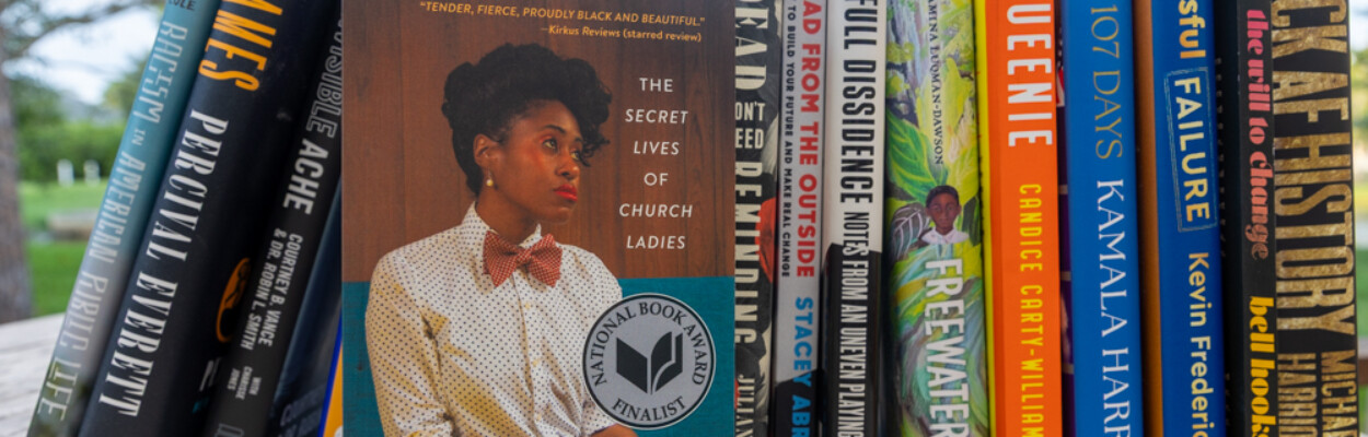 Books are lined up before the Black Book Bash.