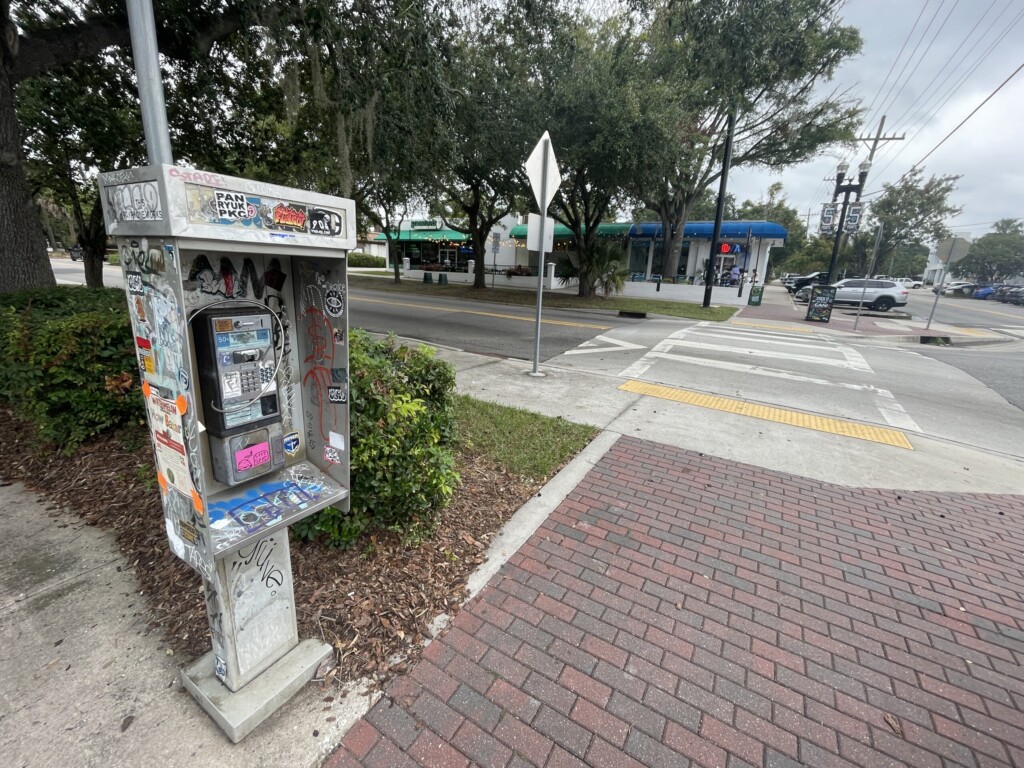 Abandoned phone booth in Five Points.