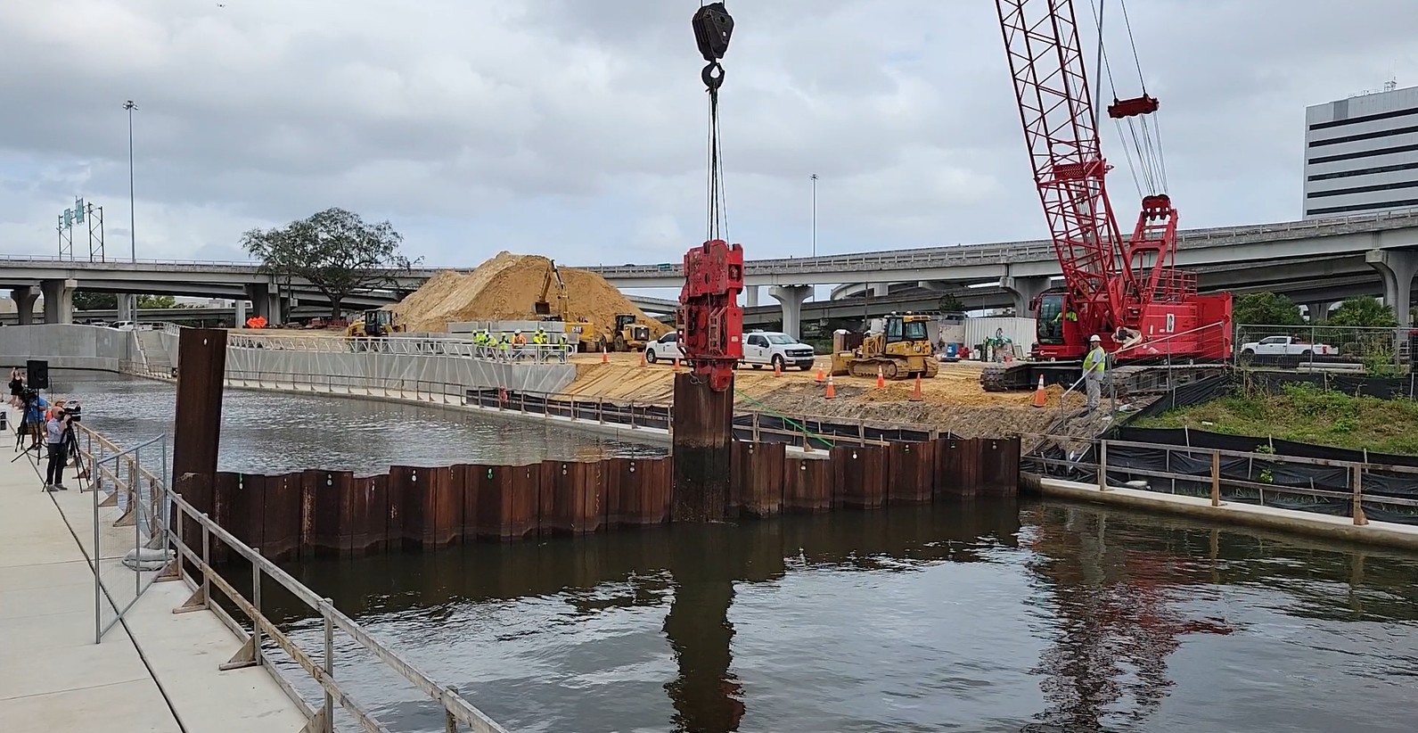 McCoys Creek flows into the St. Johns River again as a steel barrier between them is lifted.
