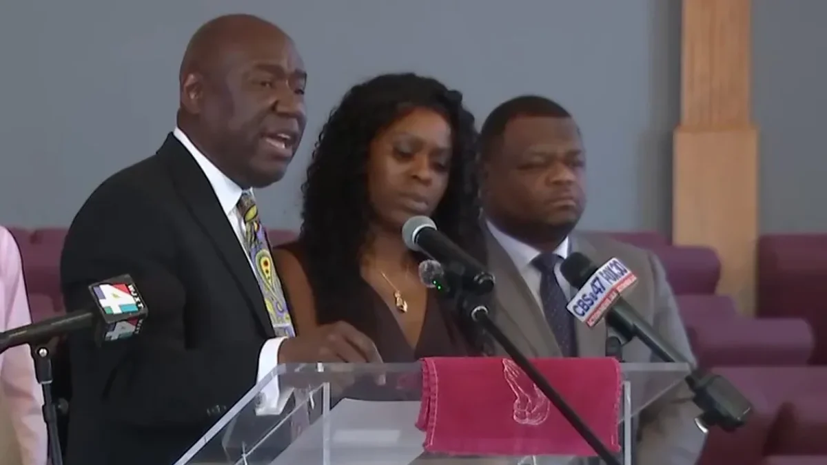 Attorney Ben Crump speaks at a news conference about the arrest of Erika McGriff