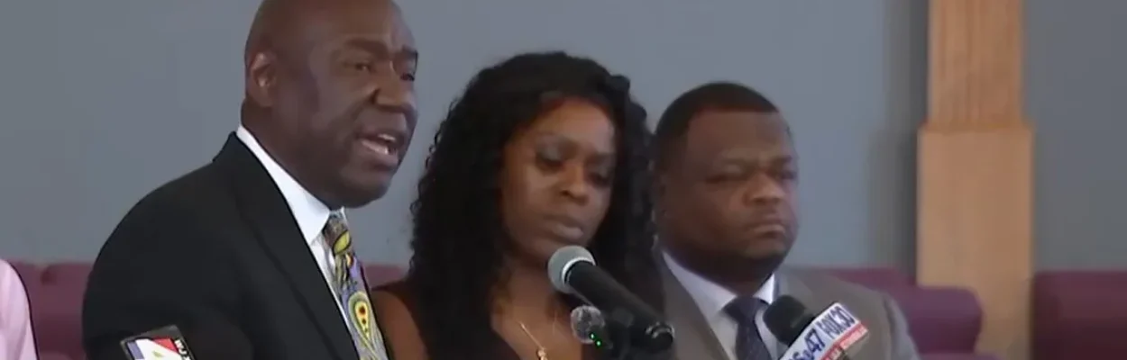Attorney Ben Crump speaks at a news conference about the arrest of Erika McGriff