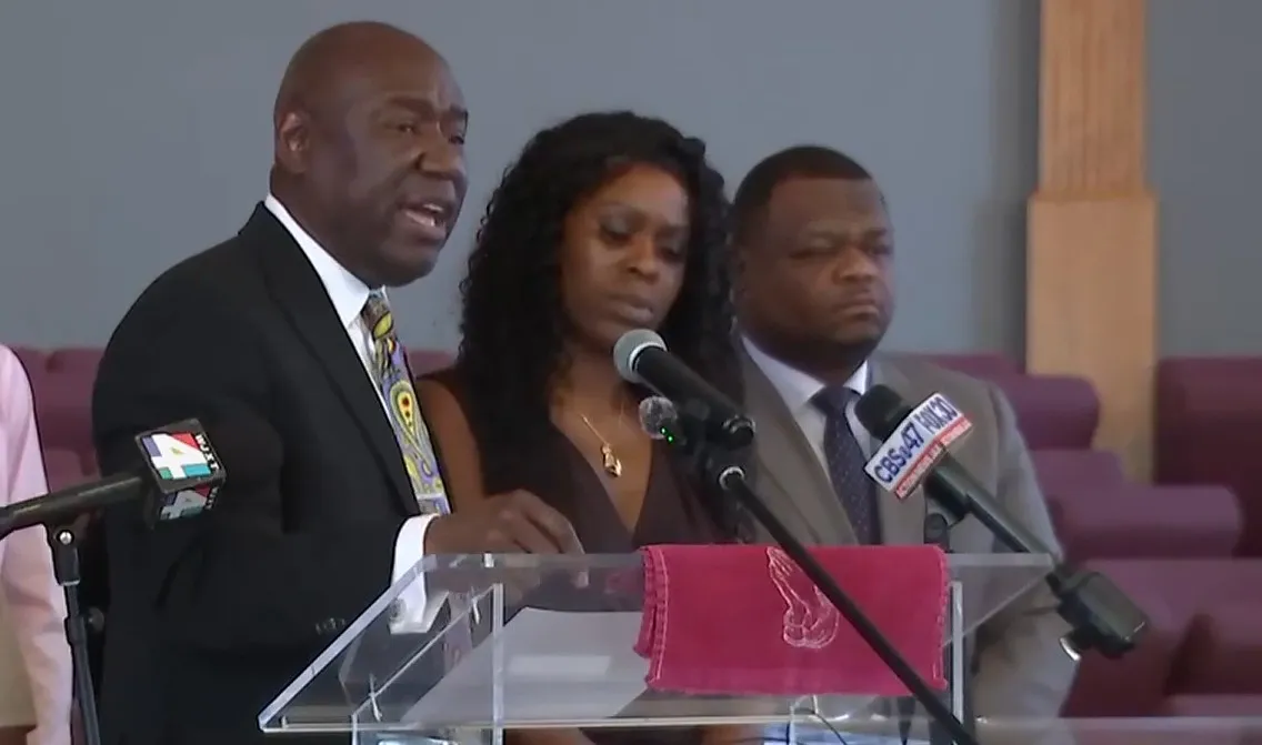 Attorney Ben Crump speaks at a news conference about the arrest of Erika McGriff