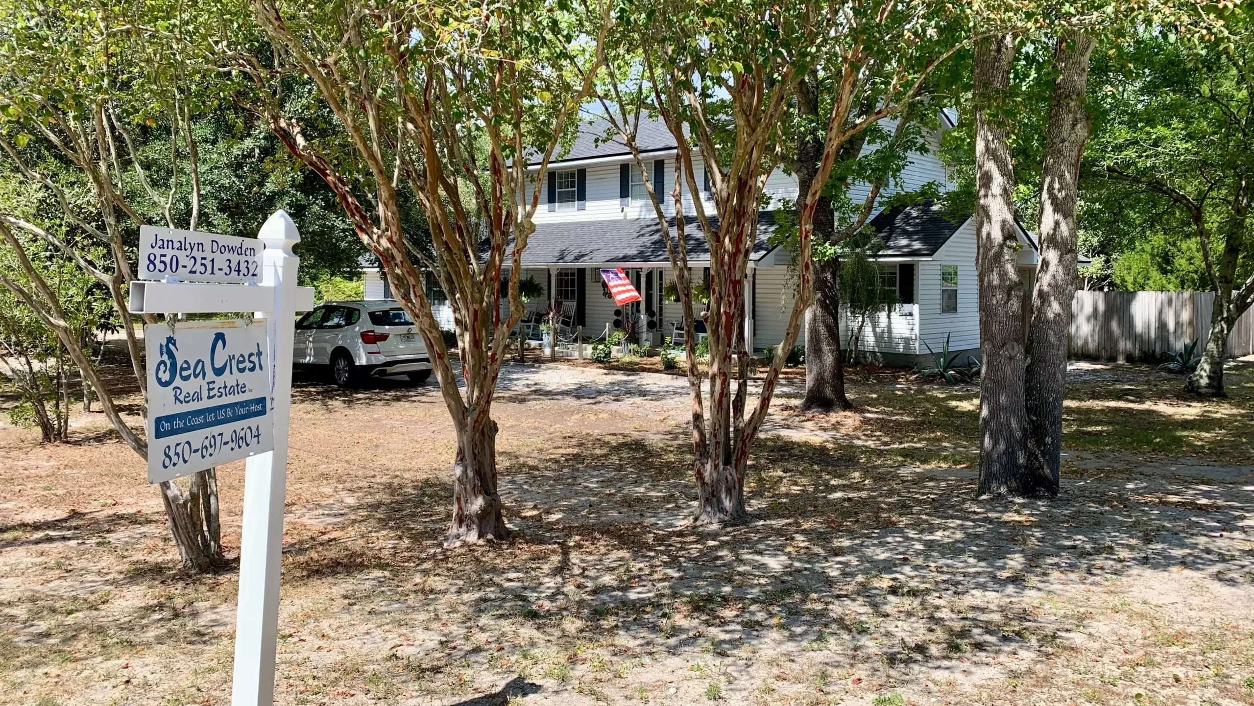 A home for sale as a UNF poll finds opposition to property taxes.