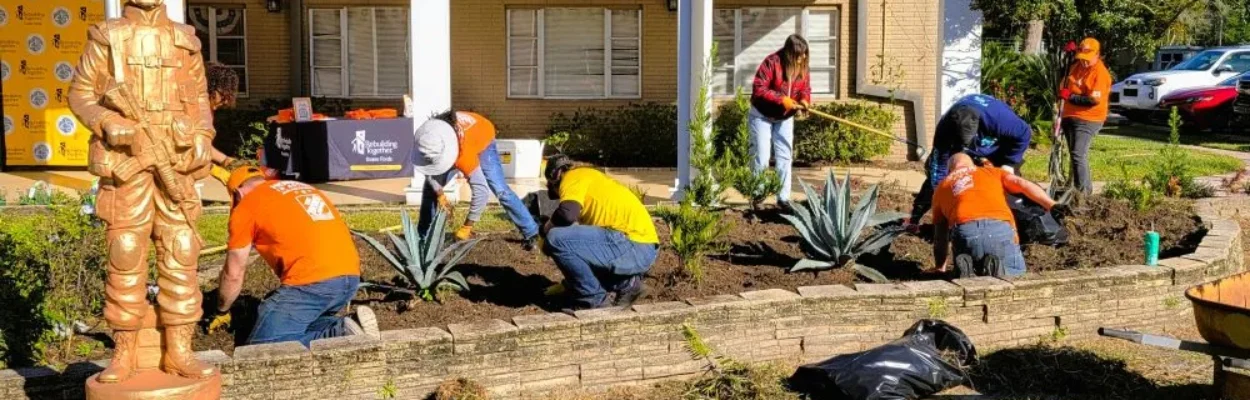 Volunteers renovate Five Star Veterans Centers gardens.