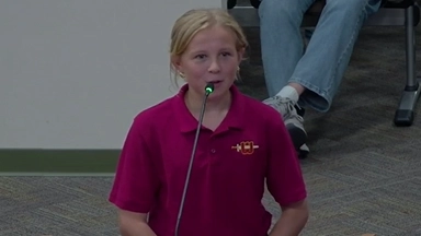 Seventh-grader Charlotte Clay speaks to the St. Johns County Commission about smoking and vaping in parks and on beaches.